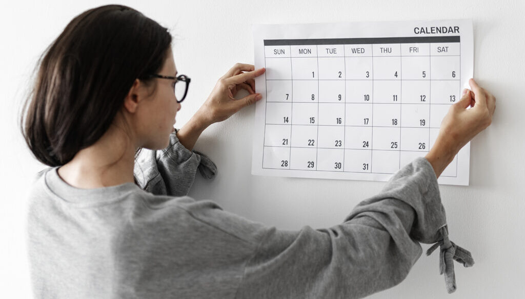 Woman checking the calendar